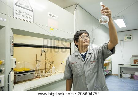 Padaeng industry Mae Sot Tak Thailand February20 2013 : Zinc mine. engineer testing in laboratory.
