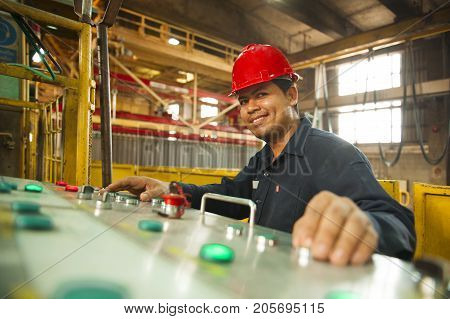Padaeng industry Mae Sot Tak Thailand February20 2013 : Zinc mine. engineer control machine in factory.