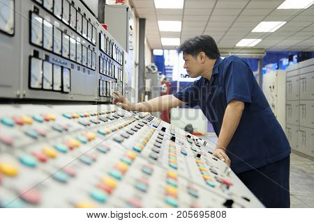Padaeng industry Mae Sot Tak Thailand February20 2013 : Zinc mine. Engineer in control room.