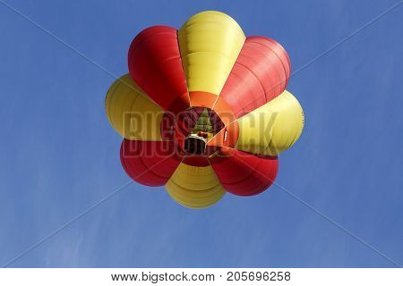 Bristol, UK: August 13, 2016: Flying a balloon at the Bristol International Balloon Fiesta. The annual event has become Europe's largest hot air balloon festival.
