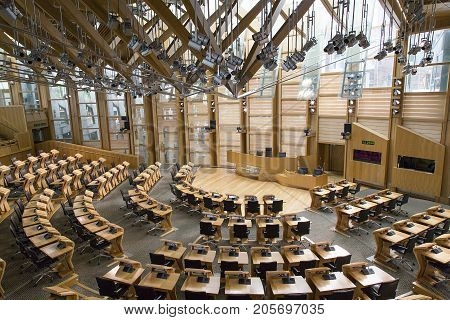 Edinburgh, Scotland, UK: May 27, 2016: The Debating Chamber of the Scottish Parliament in Edinburgh. The building was designed by Spanish Catalan architect Enriq Miralles and opened in 2004.