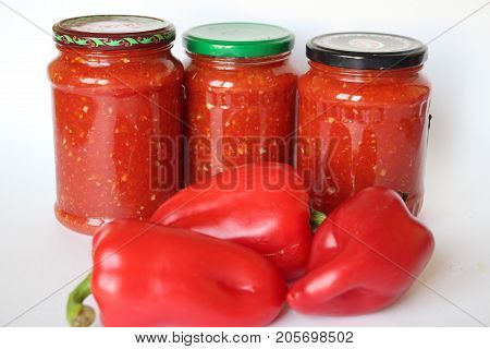 sauce of tomato,garlic, pepper and spices in jars