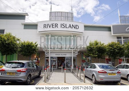 Swansea, UK: July 09, 2017: A branch of River Island. The chain retails affordable fashion and has 300 stores across the UK, Ireland and internationally.