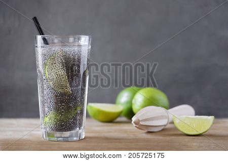 Chia fresca with lime juice simple recipe of super food cocktail for every day healthy eating routine, space for a text
