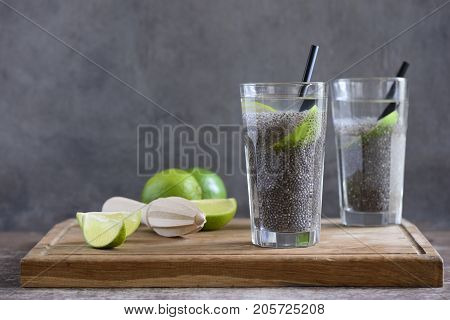 Chia fresca with lime juice simple recipe of super food cocktail for every day healthy eating routine, space for a text