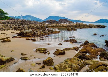 Rocky Beach At Sunset. Beautiful Gold Sundown At Rocky Coast. Selective Focus