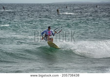 January 25 2014 Los Barriles Mexico: kiteboarder rides rough water at the 'Lord of the Wind' kite surf competition