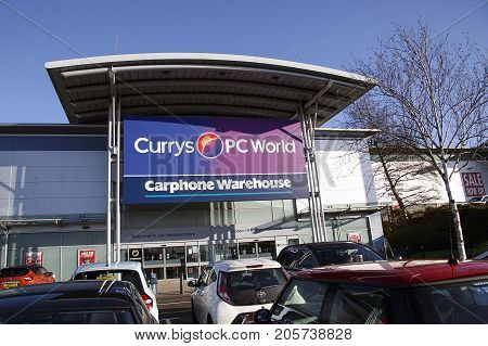 Swansea, UK: December 28, 2016: Currys and PC World Store incorporating a Carphone Warehouse. Building exterior of a computer hardware store.