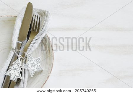 Festive Table Setting With Christmas Decorations on Rustic Wooden Background for Christmas Eve. Top View. Copy Space. Selective Focus.