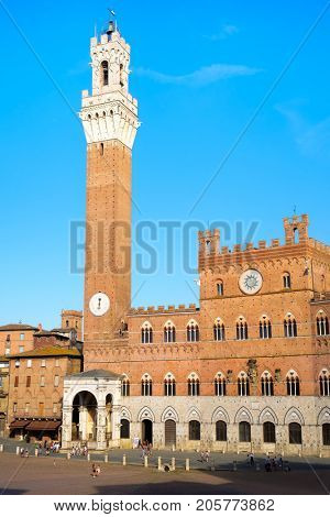 The Palazzo Publico at Piazza del Campo on the medieval city of Siena, Italy