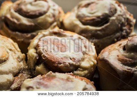 Cinnabon Rolls With Cream Cheese Glaze On Plate