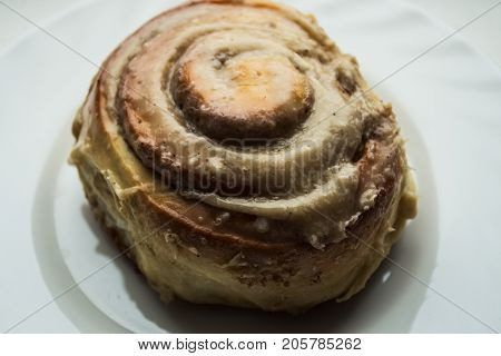 Cinnabon Rolls With Cream Cheese Glaze On Plate