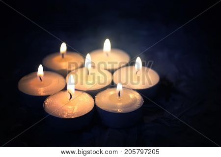 Burning Candles On Dark Background. Festive Composition.