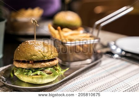 Chicken Hamberger with fries fast food