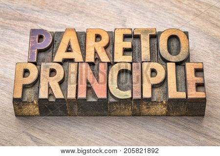 Pareto principle word abstract in vintage wood letterpress printing blocks