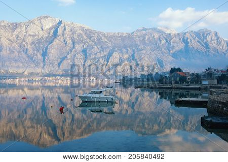 Blue winter morning of a seaside village. Montenegro, Kotor Bay of Adriatic Sea,  Stoliv