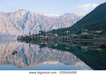 Cold winter day in Montenegro. View of the Kotor Bay (Adriatic Sea) near seaside village of Stoliv