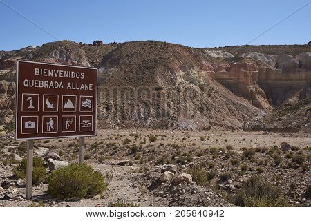 Quebrada Allane, Arica y Parinacota, Chile - August 24, 2017: Sign showing activities in the Allane River Valley on the Altiplano of northern Chile.