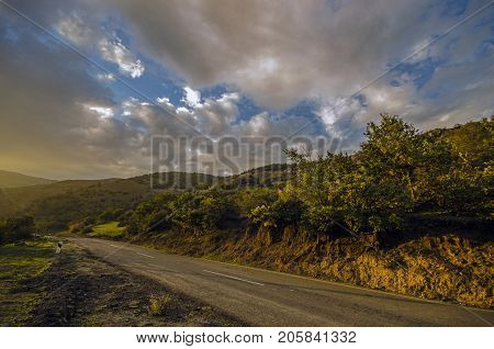 Cycling Mountain Road. Misty Mountain Road In High Mountains. Cloudy Sky With Mountain Road. Azerbai