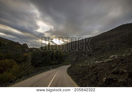 Cycling Mountain Road. Misty Mountain Road In High Mountains. Cloudy Sky With Mountain Road. Azerbai
