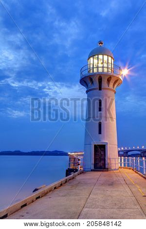 Nightfall On Singapore Lighthouse At Tuas