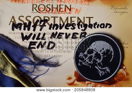 ILLUSTRATIVE EDITORIAL. Chevron of Ukrainian Army. With logo Roshen Inc. Trademark Roshen is property of Ukrainian president Poroshenko. MH17 flight investigation. Kiev,Ukraine.September 10, 2017