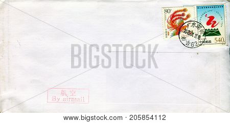 GOMEL, BELARUS - AUGUST 12, 2017: Old envelope which was dispatched from China to Gomel, Belarus, August 12, 2017. 