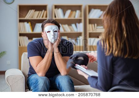 Man attending psychology therapy session with doctor