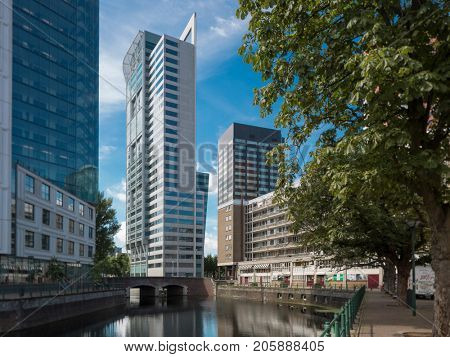 Rotterdam cityscape with canal and skyscraper
