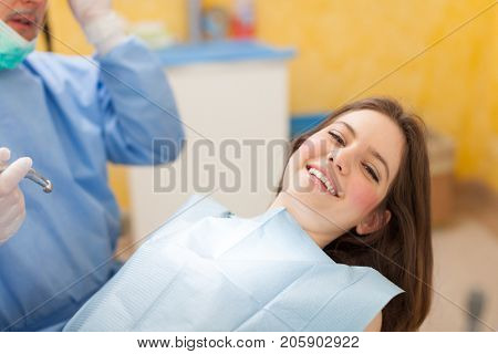 Dentist doing a dental treatment on a patient
