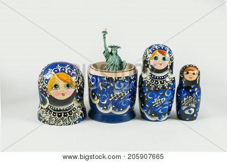 Statue of Liberty inside of Russian nesting doll. USA and Russia relations, cold war, conflict and influence conceptual background