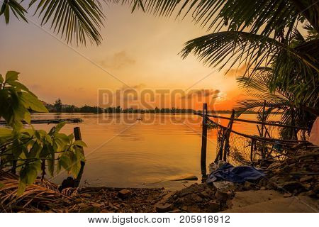 Vinh Cura Dai river in Hoi An Vietnam at sunset
