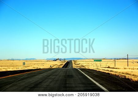 driving in the historical route 66 near Death Valley in Nevada in USA.