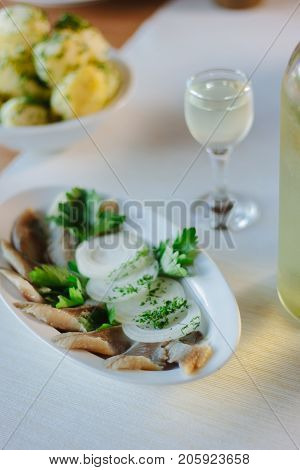 Salty herring on restaurant table - nice food.