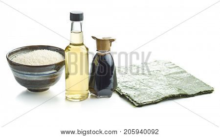 The sushi ingredient. Nori, rice, rice vinegar and soy sauce isolated on white background.