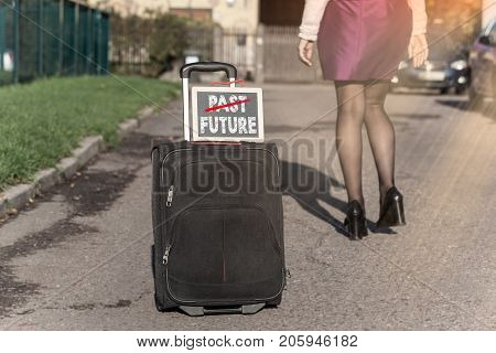 Past and Future concept. woman with travel bag on the street, getting ready for jorney.