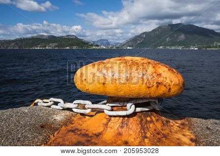 Sunny Norwegian landscape. View of the route of the Lauvvik - Oanes ferry. Berth in Norway. Bitt Close up