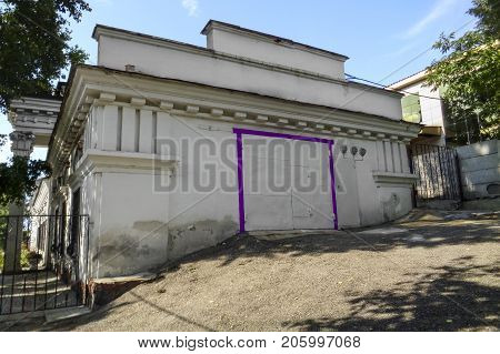 Very old building on the Ostrovsky street. Ust-Kamenogorsk. Empire style. Kazakhstan. Historical heritage