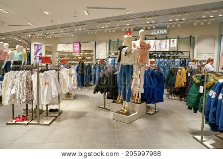 SAINT PETERSBURG, RUSSIA - CIRCA AUGUST, 2017: inside Koton store at Galeria shopping center. Galeria is major shopping and entertainment center is located in downtown of St. Petersburg