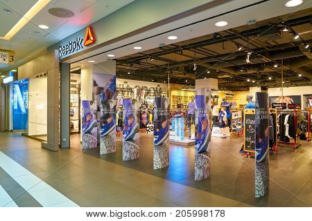 SAINT PETERSBURG, RUSSIA - CIRCA AUGUST, 2017: Reebok store at Galeria shopping center. Reebok is a global athletic footwear and apparel company.
