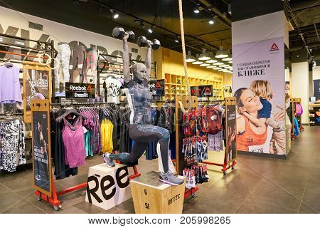 SAINT PETERSBURG, RUSSIA - CIRCA AUGUST, 2017: inside Reebok store at Galeria shopping center. Reebok is a global athletic footwear and apparel company.