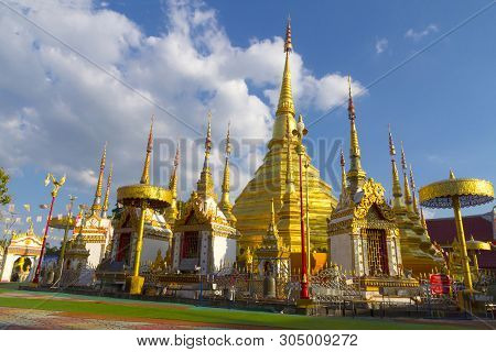 Pagoda Gold And Blue Sky Beautiful With Cloud At Wat Phra Bat Ban Tak, Tak Province, Of Thailand