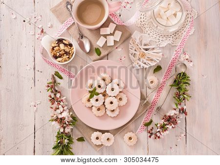 Canestrelli Biscuits With Icing Sugar On Wooden Table.
