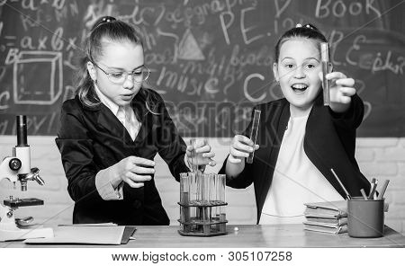 Be Careful Performing Chemical Reaction. Basic Knowledge Of Chemistry. Girls Study Chemistry. Make S