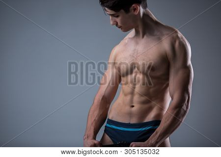 Muscular Fitness Young Male Antique Perfect Muscles Six Packs Of Abs And Bare Chest. Bodybuilder Mod