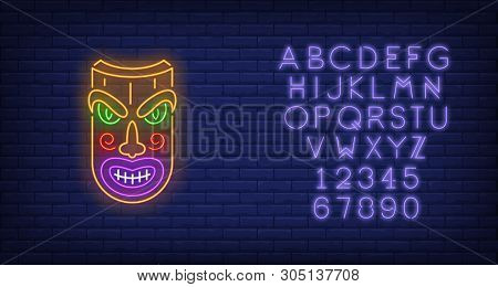 Wooden Tribal Mask Neon Sign. Tiki Idol, Ancient Culture Design. Night Bright Neon Sign, Colorful Bi