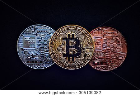 Stack Of Glod Bitcoins With A Single Coin Facing The Camera In B Sharp Focus, Cryptocurrency Concept
