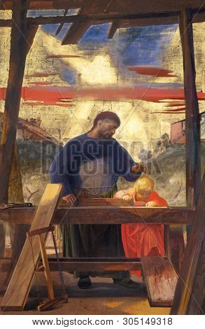 FLORENCE, ITALY - JANUARY 11, 2019: Altarpiece of saint Joseph the Worker, by Pietro Annigoni in the Basilica di San Lorenzo in Florence, Italy