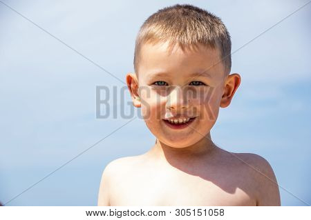 Boy On The Beach