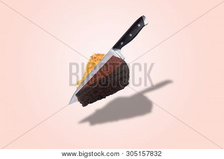 Knife Cuts Conjoined Honey And Chocolate Cake, Levitating Pastry, Background Photo Of Sweet Dessert